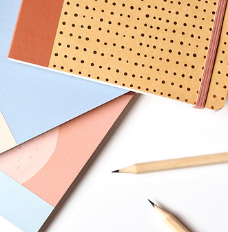 Notebooks and Pencils