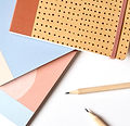 Notebooks and Pencils