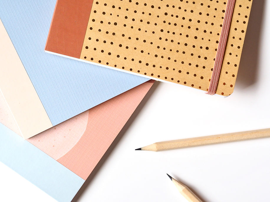 Notebooks and Pencils
