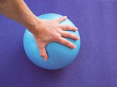 Hand on exercise ball