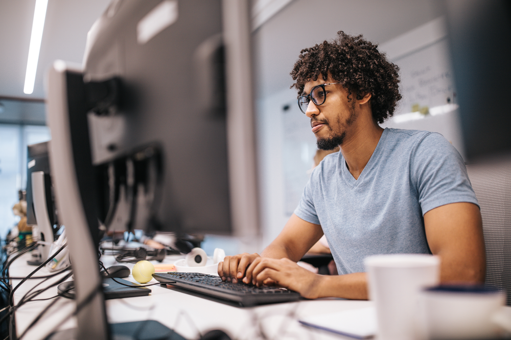 Person working on laptop in an office