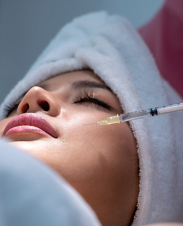A woman getting filler injection