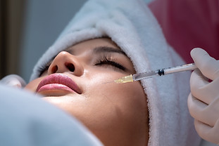A woman getting filler injection