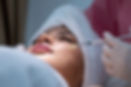 A woman getting filler injection