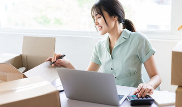 Woman checking her orders before delivery