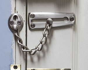 Three locks on door