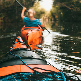 Kayaking Through Narrow Waterway