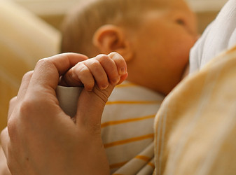 Mother Holding Baby's Hand