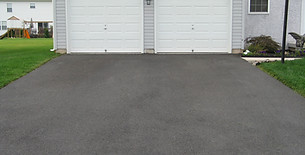Driveway in front of house untreated