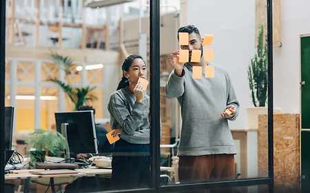 Team brainstorming, sticky notes, planning
