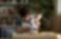 The Boy Pouring Coins on the Table