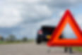 A car with a breakdown alongside the road