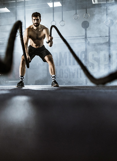 Man Training with Ropes