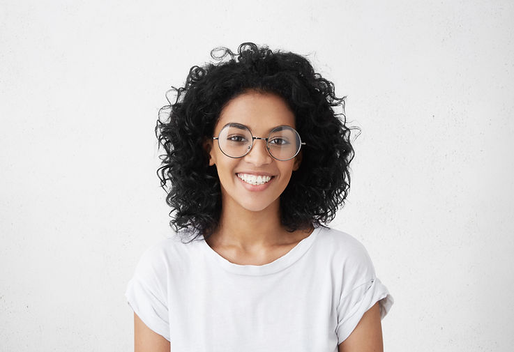 Woman wearing Nikon lenses with optometrists prescription from tottenham ontario.