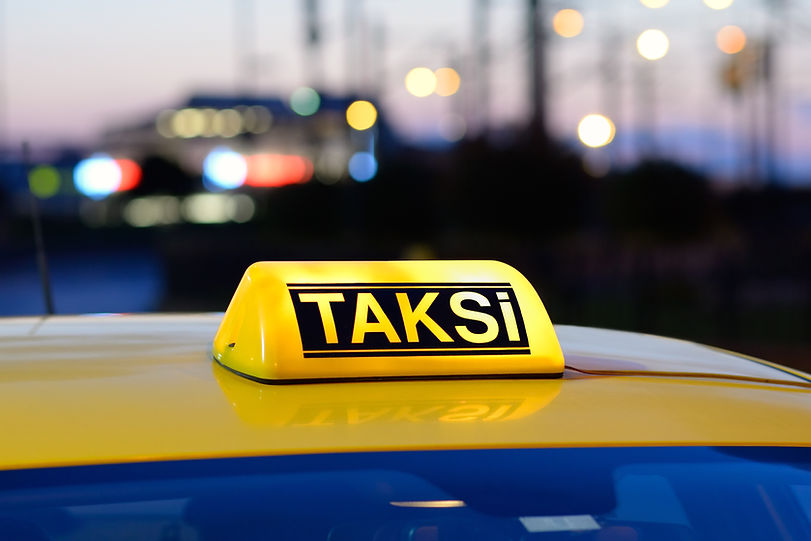 Taxi Sign at Dusk