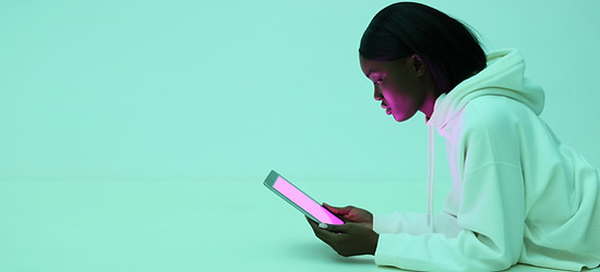 Girl looking at tablet
