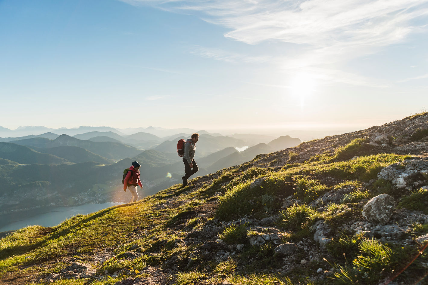 Young couple on mountain with view to lake