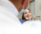 Woman Smiling at Dentist