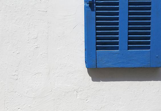 Blue Shuttered Window