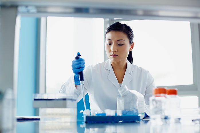 Scientist Pipetting