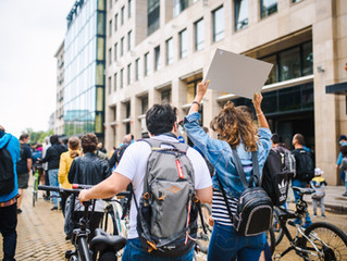 Passports, Protests, & Polarization: Have we peaked?