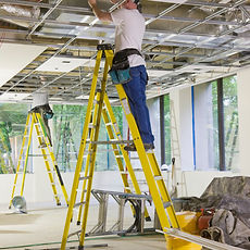 Electrician wiring new ceiling
