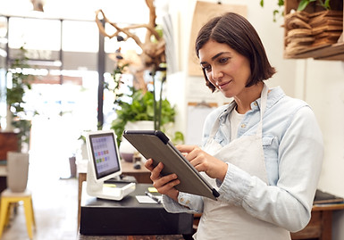 Barista worker using laptop