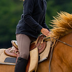 Woman riding a horse