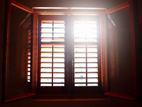 Wooden window with sunshine