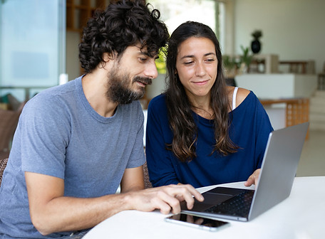 Couple Using Laptop
