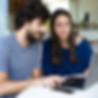 Couple Using Laptop