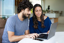 Couple Using Laptop