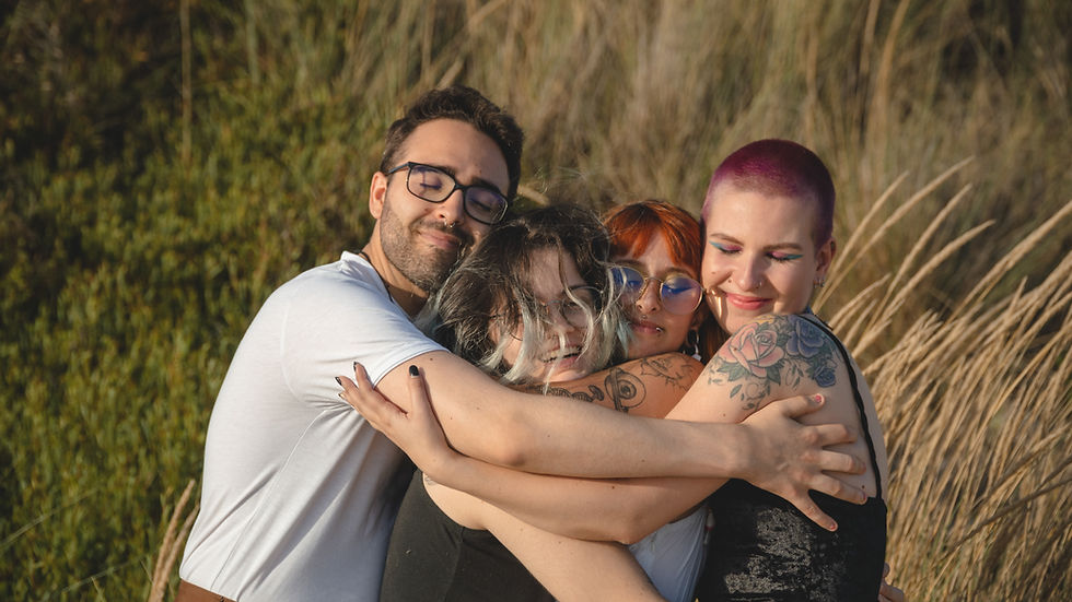 Group hug between gender diverse friends