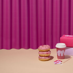 a display of donuts and coffee