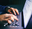 Typing on Laptop