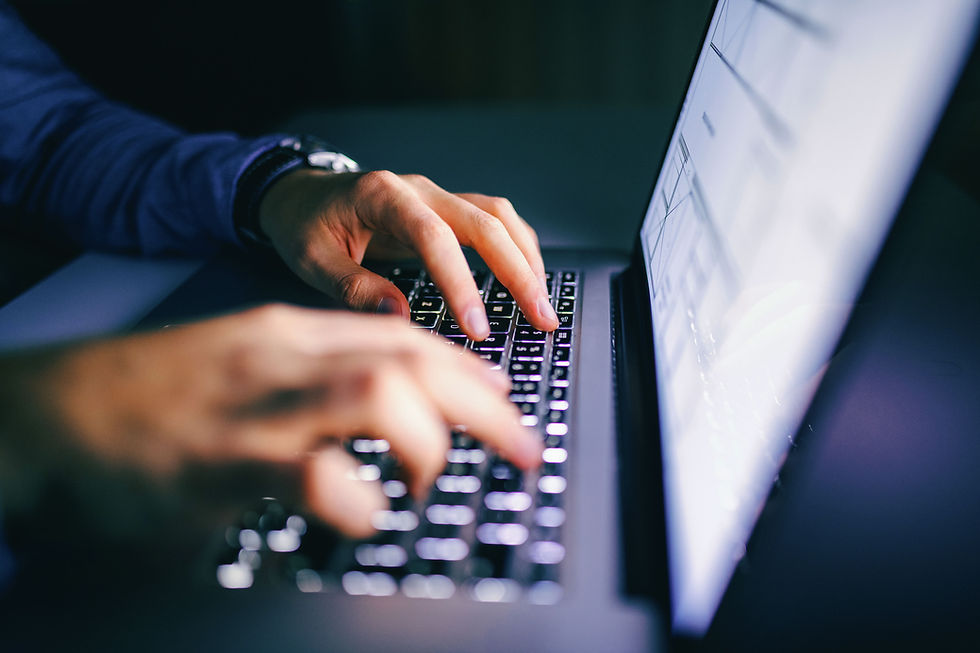 Typing on Laptop