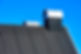 Felt rooftop with covered chimney