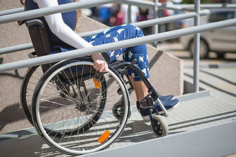 wheelchair ramp help for a young woman