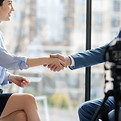 Shaking Hands in Front of a Camera