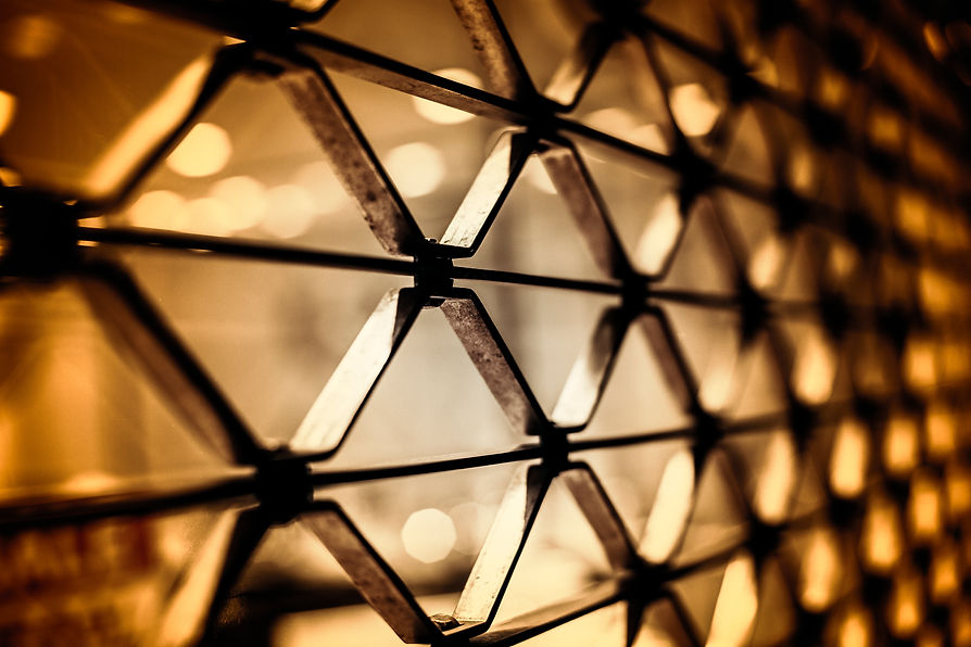 Close-up of a metal grid with diamond-shaped patterns