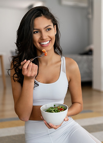 Woman eating healthy salad