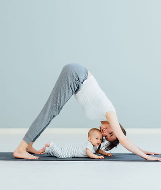 Mother Doing Yoga with Baby