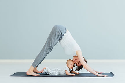 Mother Doing Yoga with Baby