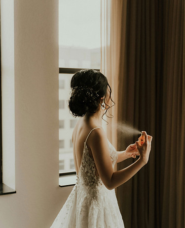 Bride Applying Perfume