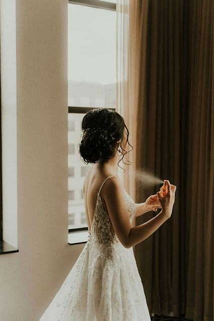 Bride Applying Perfume