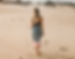 Woman Walking on the Beach