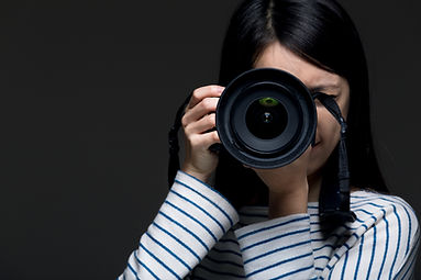 女性カメラマン
