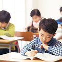 School Kids Studying In Class
