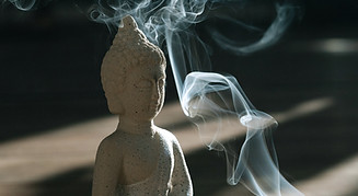 Statue With Incense