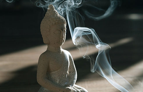 Statue With Incense